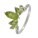 Wen green gemstone crown ring with marquise peridot stones in crown arrangement on sterling silver band with pave accents